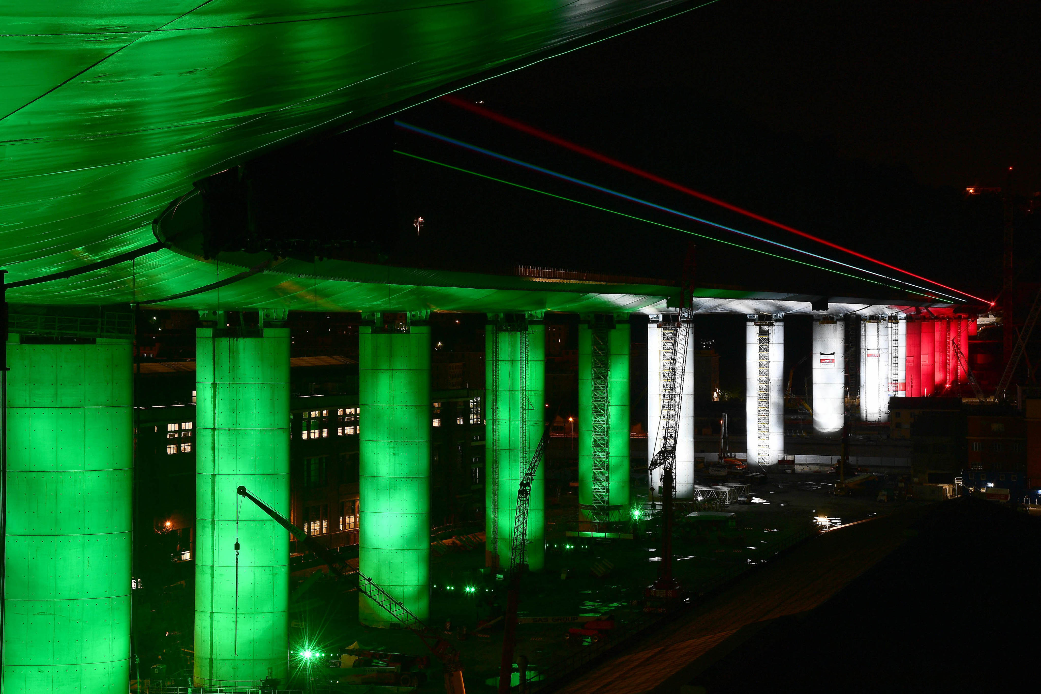 Bridge at night, illuminated with the colours of the Italian flag